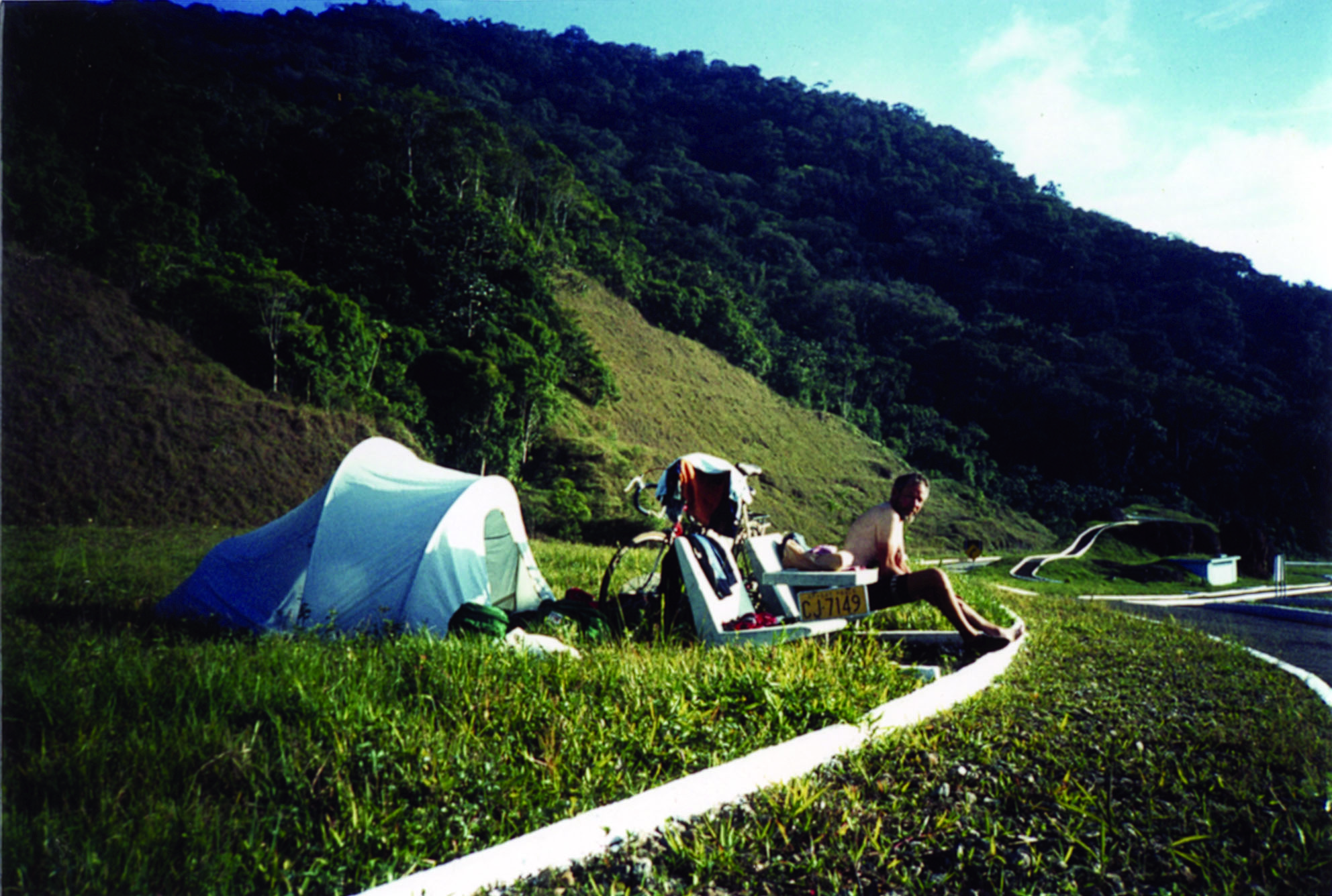 Diary writing at the Atlantic scenic lookout. I wonder if the Prohibida notices mean, no tents – no camping? Day 37